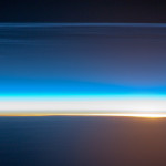 Polar Mesospheric Clouds Illuminated by Orbital Sunrise